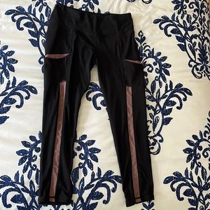 Black leggings with mesh strips